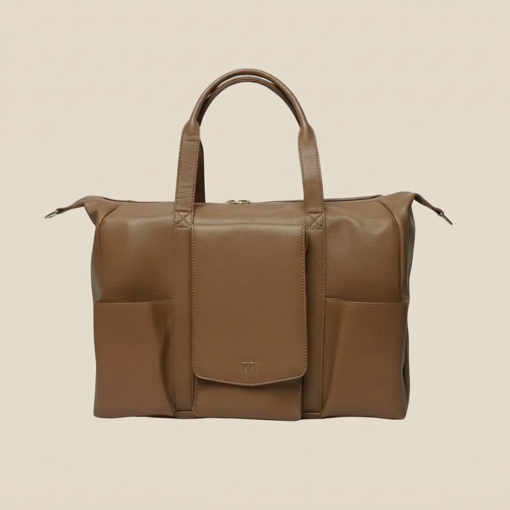 Brown premium leather mommy bag with a visible brand logo on a white background
