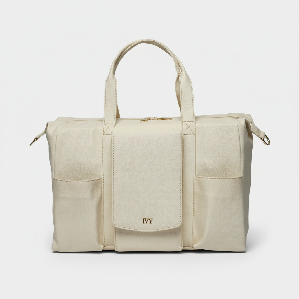 Beige handbag with 'IVY' branding on a white background